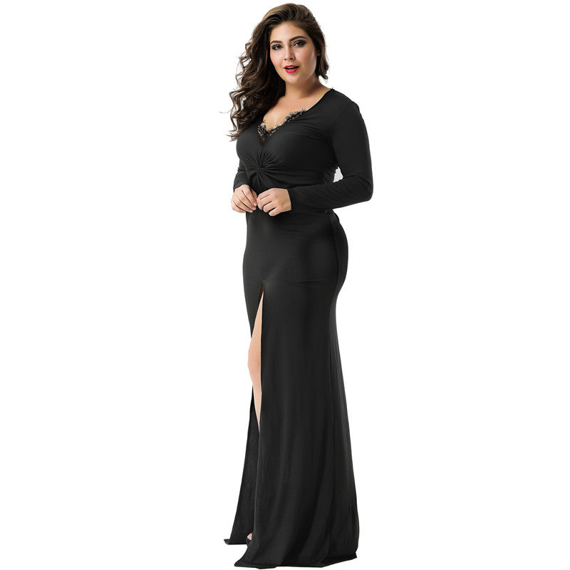 Black plus size evening dress with a sleek, modern design and thigh-high slit for a bold look.